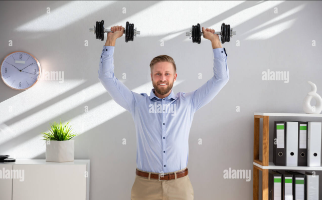 Man lifting dumbbells in an office setting